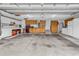 Spacious garage with ample storage cabinets and work area at 552 Enoree Ct., Myrtle Beach, SC 29588