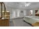 Large main bedroom features a king bed, access to a private patio and an ensuite bath at 552 Enoree Ct., Myrtle Beach, SC 29588