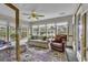 Relaxing sunroom features lots of natural light and serene views of the water at 552 Enoree Ct., Myrtle Beach, SC 29588
