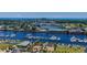 Picturesque aerial view of a bustling marina with waterfront dining and shops, creating a vibrant coastal scene at 5751 Oyster Catcher Dr. # 334, North Myrtle Beach, SC 29582