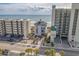 Aerial view of a condominium building near the ocean and several other resorts at 5751 Oyster Catcher Dr. # 334, North Myrtle Beach, SC 29582