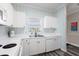 Bright kitchen featuring updated appliances and a view to the outdoors at 5751 Oyster Catcher Dr. # 334, North Myrtle Beach, SC 29582