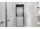This laundry closet features a stackable washer and dryer unit at 5751 Oyster Catcher Dr. # 334, North Myrtle Beach, SC 29582
