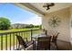 Relaxing patio with a compass decoration overlooking the green golf course at 5751 Oyster Catcher Dr. # 334, North Myrtle Beach, SC 29582