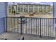 View from the balcony showcasing the parking area and surrounding building at 5905 South Kings Hwy. # 135, Myrtle Beach, SC 29575
