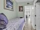 Comfortable bedroom showcases a twin bed with a coastal-themed decor and is bathed in soft, natural light at 5905 South Kings Hwy. # 135, Myrtle Beach, SC 29575