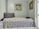 Charming bedroom with calming decor, a comfortable twin bed, and tasteful wall art, creating a serene ambiance at 5905 South Kings Hwy. # 135, Myrtle Beach, SC 29575