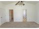 A well-lit bedroom offers doorways to a walk-in closet and an attached bathroom at 601 Blue Daisy Ct., Loris, SC 29569