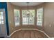 Bright breakfast nook featuring large windows providing ample natural light and modern chandelier at 601 Blue Daisy Ct., Loris, SC 29569