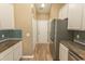 Well-designed kitchen boasts stainless steel appliances and ample counter space at 601 Blue Daisy Ct., Loris, SC 29569