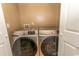 Convenient laundry area featuring modern front-load washer and dryer units for efficient laundry care at 601 Blue Daisy Ct., Loris, SC 29569