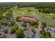 Aerial view of a country club surrounded by beautiful green landscape at 6095 Catalina Dr. # 1613, North Myrtle Beach, SC 29582