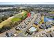 Stunning aerial view of Greg Norman Golf Course community featuring a sparkling pool and lush landscaping at 6095 Catalina Dr. # 1613, North Myrtle Beach, SC 29582