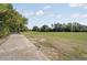 Scenic view of lush green Greg Norman golf course fairway with well-manicured grass and trees at 6095 Catalina Dr. # 1613, North Myrtle Beach, SC 29582
