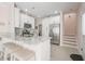 Modern kitchen with granite counters, white cabinets, and stainless-steel appliances at 6095 Catalina Dr. # 1613, North Myrtle Beach, SC 29582