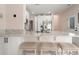Bright kitchen with a breakfast bar, white cabinetry, and stainless-steel appliances at 6095 Catalina Dr. # 1613, North Myrtle Beach, SC 29582
