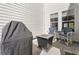 Outdoor patio featuring modern seating and a barbecue grill, ideal for summer gatherings at 6095 Catalina Dr. # 1613, North Myrtle Beach, SC 29582