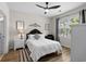 Inviting bedroom featuring a comfortable bed, stylish decor, and a bright window at 6253 Catalina Dr. # 422, North Myrtle Beach, SC 29582