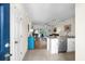 Inviting entryway featuring a view of the open-concept living area and modern kitchen at 6253 Catalina Dr. # 422, North Myrtle Beach, SC 29582