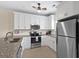 Well-lit kitchen with stainless steel appliances, granite counters, and plenty of cabinet space at 6253 Catalina Dr. # 422, North Myrtle Beach, SC 29582