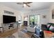 Living room with comfortable seating, view into bedroom, and stylish coastal decor at 6253 Catalina Dr. # 422, North Myrtle Beach, SC 29582