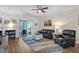 Inviting living room featuring access to a balcony, comfortable seating, and coastal decor at 6253 Catalina Dr. # 422, North Myrtle Beach, SC 29582