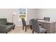 Comfortable home office with neutral walls, large window, and ample seating for productivity at 627 Culmen Ct., Myrtle Beach, SC 29588