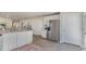 Spacious kitchen showcasing stainless steel appliances and wood-look flooring at 627 Culmen Ct., Myrtle Beach, SC 29588