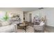 Bright living room with modern decor, stylish furnishings, and wood-look flooring at 627 Culmen Ct., Myrtle Beach, SC 29588