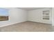 Bedroom featuring plush carpeting and bright windows with wooded outdoor views at 631 Culmen Ct., Myrtle Beach, SC 29588