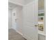 Bright entryway with a white door, a window with a view of the outdoors, and light wood-look flooring at 631 Culmen Ct., Myrtle Beach, SC 29588