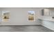 Open living room with plank flooring, natural light, and a view of the outdoors at 631 Culmen Ct., Myrtle Beach, SC 29588