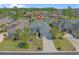 Aerial view of home with beautiful landscaping, serene lake view and great curb appeal at 631 Edgecreek Dr., Myrtle Beach, SC 29579