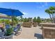 Landscaped backyard featuring an outdoor dining and seating area, and water views at 631 Edgecreek Dr., Myrtle Beach, SC 29579