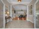 Elegant foyer with arched entryway, decorative columns, tile flooring and an open floor plan at 631 Edgecreek Dr., Myrtle Beach, SC 29579