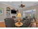 Cozy living room with fireplace, built-in shelves, comfortable seating and lots of natural light at 631 Edgecreek Dr., Myrtle Beach, SC 29579