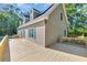 Spacious deck running along the side of a charming home with teal shutters and vinyl siding at 6357 Highway 707, Myrtle Beach, SC 29588