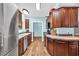 Kitchen featuring stainless steel appliances, wood cabinets, and plenty of counter space at 6357 Highway 707, Myrtle Beach, SC 29588