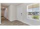 Bright entryway with a large window, wood-look floors, and neutral paint at 647 Culmen Ct., Myrtle Beach, SC 29588