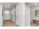 Inviting entryway with wood-look flooring, neutral walls and convenient storage bench at 655 Culmen Ct., Myrtle Beach, SC 29588