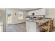 Modern kitchen with granite counters, stainless appliances, and breakfast bar seating at 655 Culmen Ct., Myrtle Beach, SC 29588