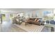 Open-concept layout showing living room and kitchen, filled with natural light at 655 Culmen Ct., Myrtle Beach, SC 29588