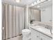 Clean bathroom featuring a shower with polka dot curtains and a modern vanity at 66 Lakeview Circle # 106, Pawleys Island, SC 29585