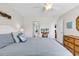 Comfortable bedroom featuring a queen bed, TV and ensuite bathroom at 66 Lakeview Circle # 106, Pawleys Island, SC 29585