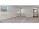 Light-filled bedroom with plush carpeting and an ensuite bathroom entrance at 663 Culmen Ct., Myrtle Beach, SC 29588