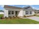 Inviting front porch with a charming design and meticulously maintained landscaping at 663 Culmen Ct., Myrtle Beach, SC 29588
