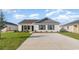 Charming single-story home with manicured lawn and a concrete driveway at 663 Culmen Ct., Myrtle Beach, SC 29588