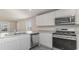 Well-equipped kitchen boasting stainless steel appliances and ample countertop space at 663 Culmen Ct., Myrtle Beach, SC 29588