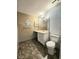 Functional bathroom with a vanity sink and toilet, ready for renovation and personalization at 6638 Greenslake Point, Myrtle Beach, SC 29588