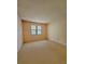 Standard bedroom with a window, carpet flooring and neutral color for design freedom at 6638 Greenslake Point, Myrtle Beach, SC 29588